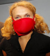 woman with bra over her mouth