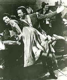 Errol Flynn spanking woman's bottom